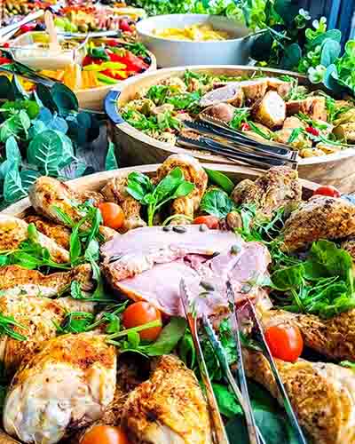 Bespoke event catering with buffet table grazing platters by gourmet grazing